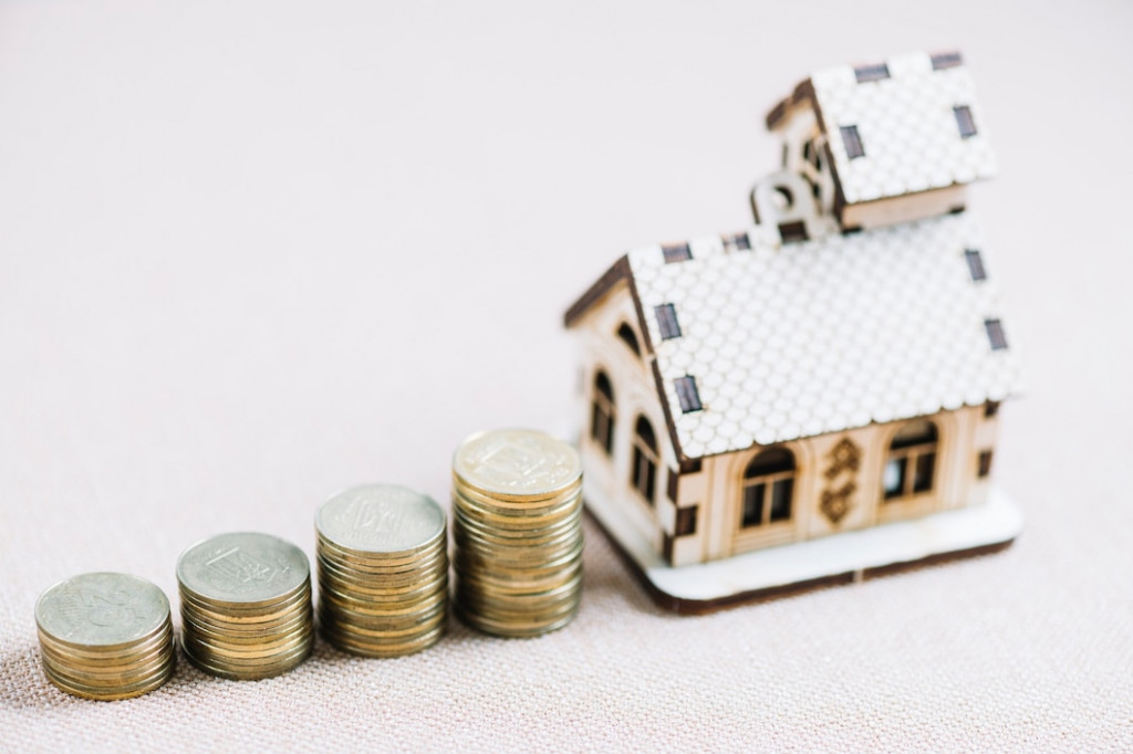Or et immobilier : un choix monétaire concret pour les investisseurs